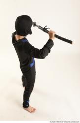 Man Young Athletic Fighting with sword Standing poses Casual Asian